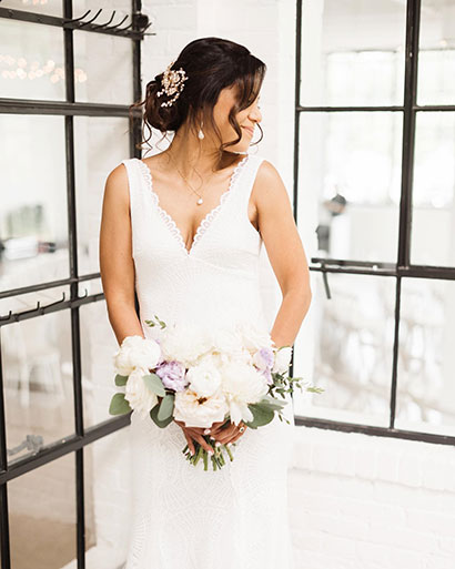 Bridal hairstyle and makeup portrait with flowers