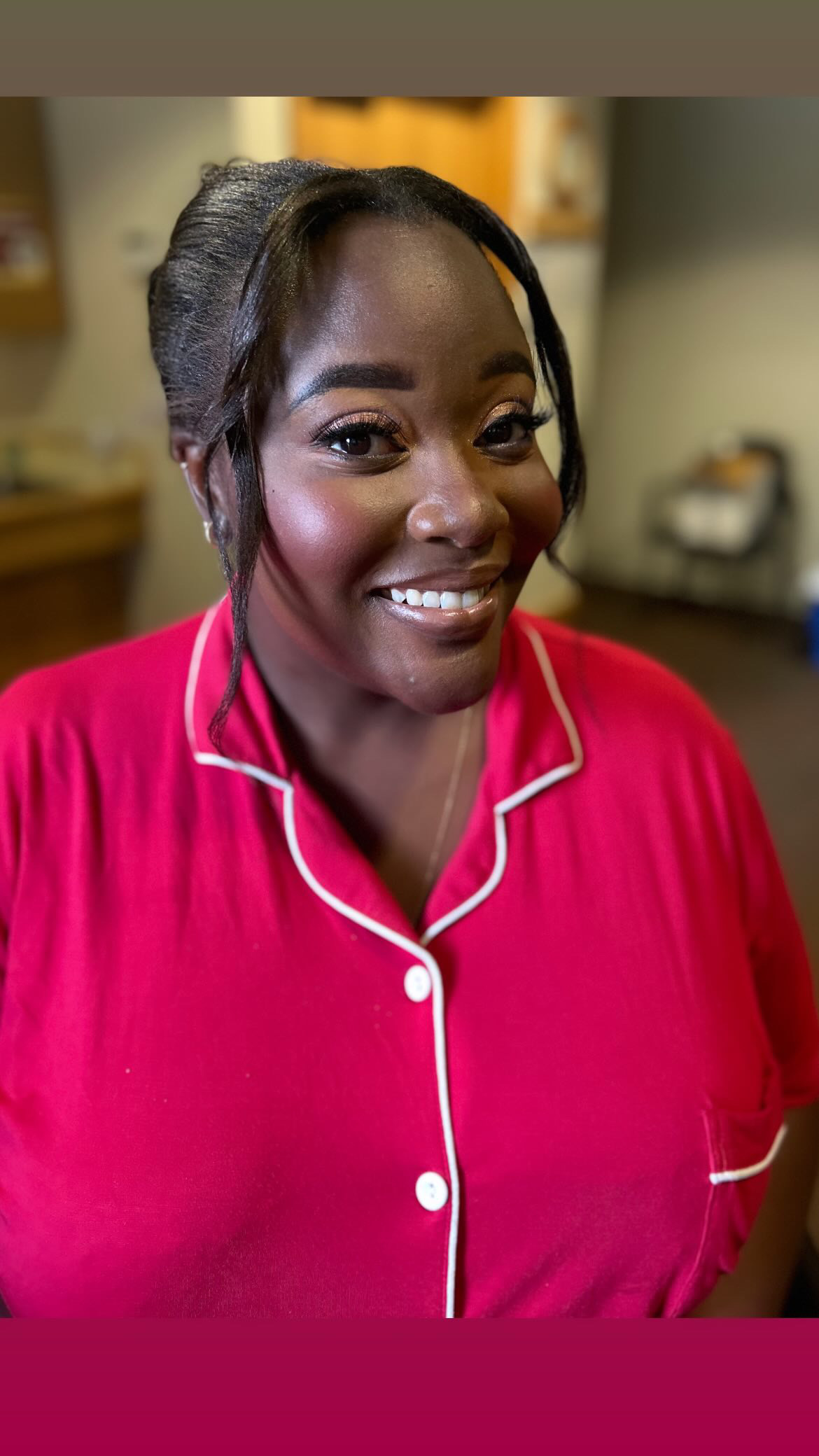 Bridal makeup close-up in a pink getting-ready robe