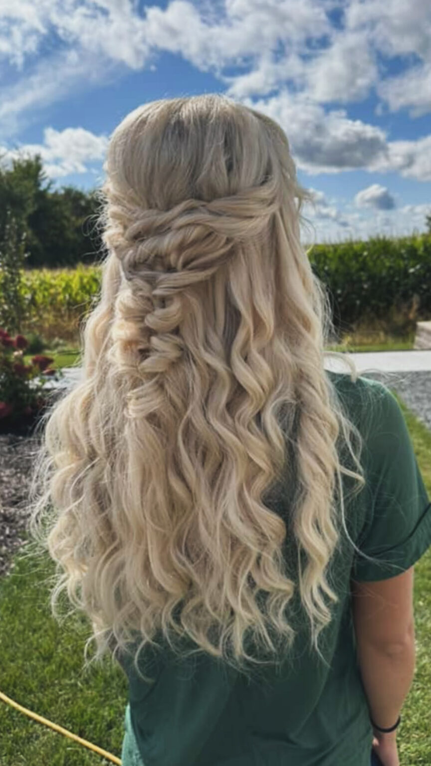 Bride with polished bridal hair and makeup by Beaute' Beautique